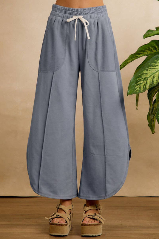 FRENCH TERRY OUT SEAM DETAIL TULIP HEM PANTS