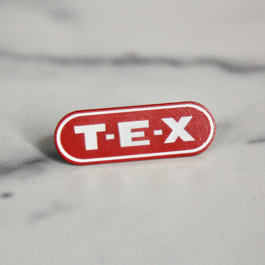 T-E-X 1.75" Wide White Enamel Lapel Pin