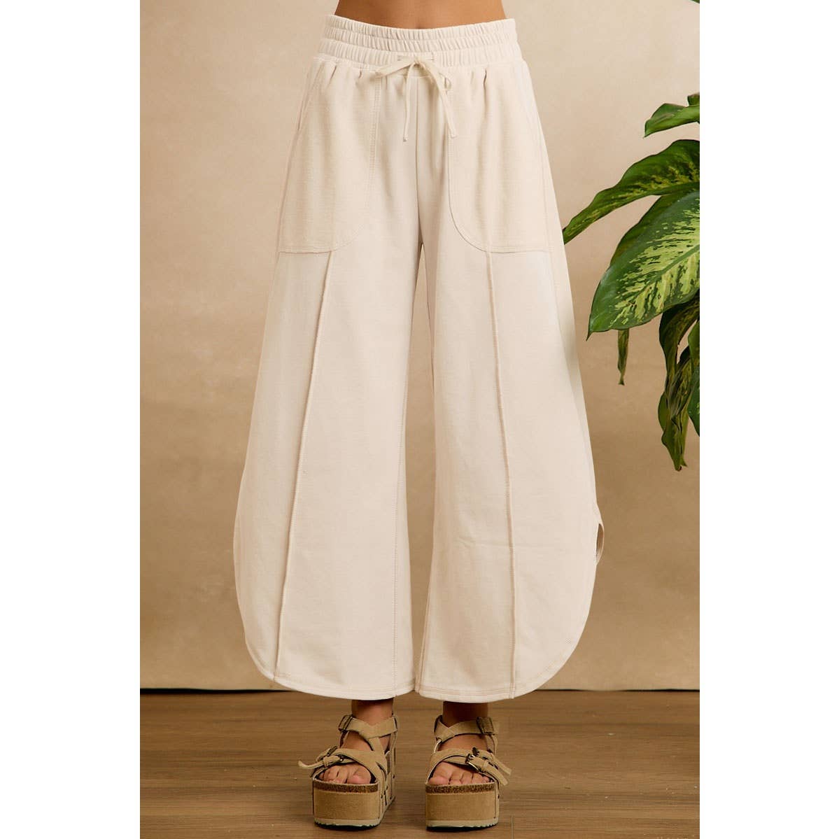 FRENCH TERRY OUT SEAM DETAIL TULIP HEM PANTS