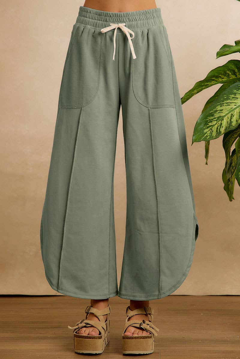 FRENCH TERRY OUT SEAM DETAIL TULIP HEM PANTS