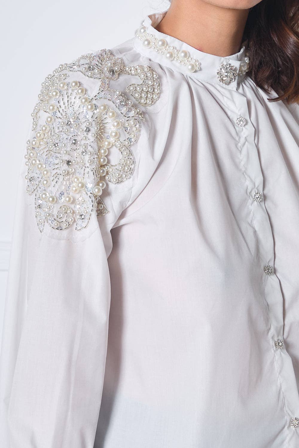 Shirt with beaded embroidery on the shoulders